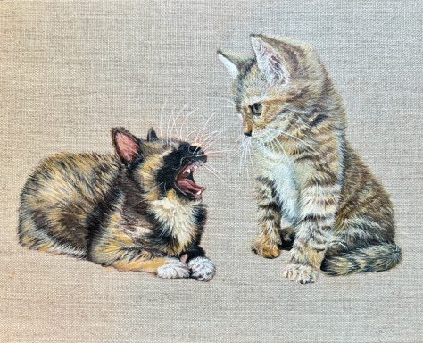 painting of two kittens looking at each other