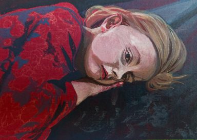 A girl with fair hair rests her head on her hand, wearing a red floral dress.