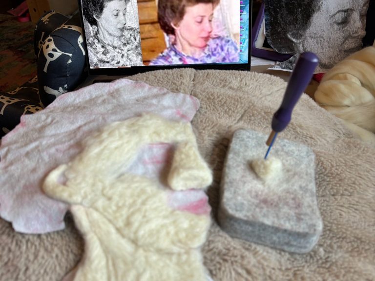 Starting the needle-felt portrait of Grandma The start of the process of needle-felted relief portrait of a woman